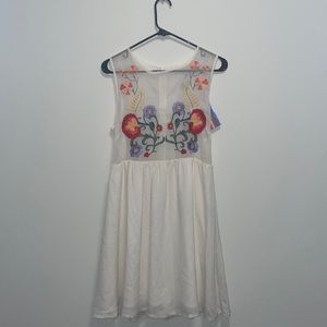 White dress with floral embroidery